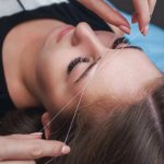 Hair removal with a thread on the face. Training, thread twisting technique 